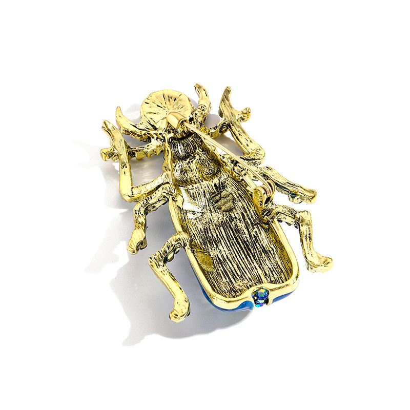 Broche vintage en forme de sca - Vintage Fashion Bug avis et prix