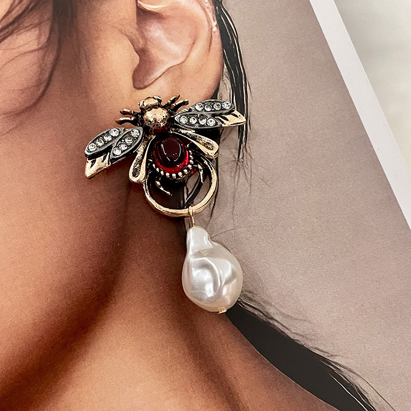 Boucles d'oreilles pendantes V - Vintage Fashion Bug avis et prix